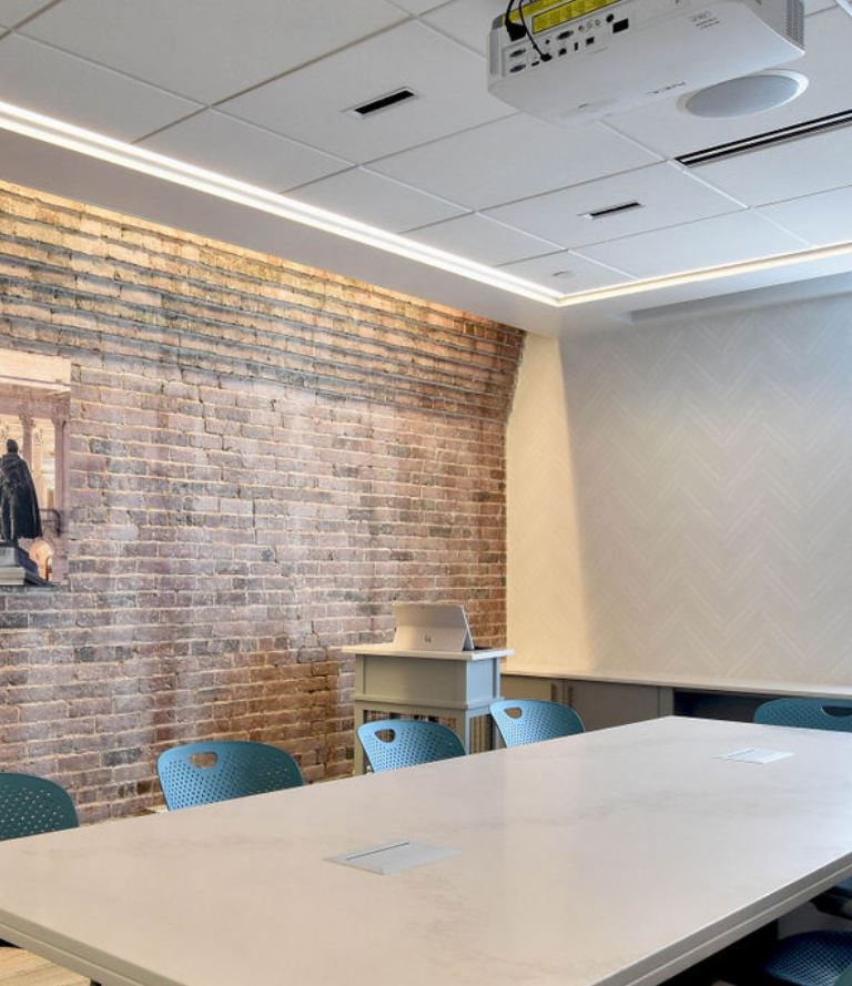 Gotham MYO downlights, Mark Slot2 Direct, and Ecosense Wall washing layer glare free lighting for the conference room